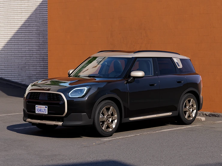 MINI Countryman'ın Midnight Black ve Vibrant Silver çatı parkında önden görünümü.